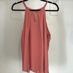 Peach blouse with gold accents